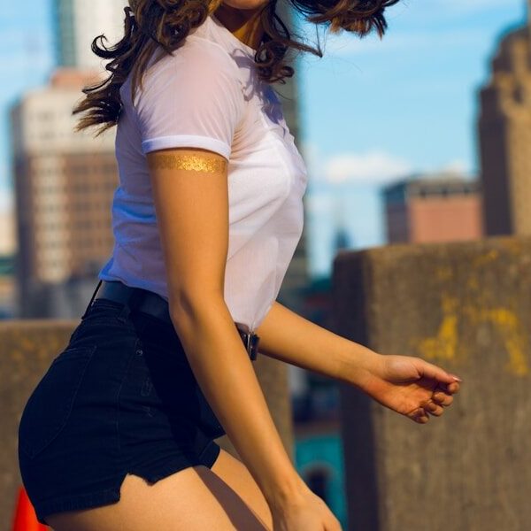 woman wearing white shirt standing